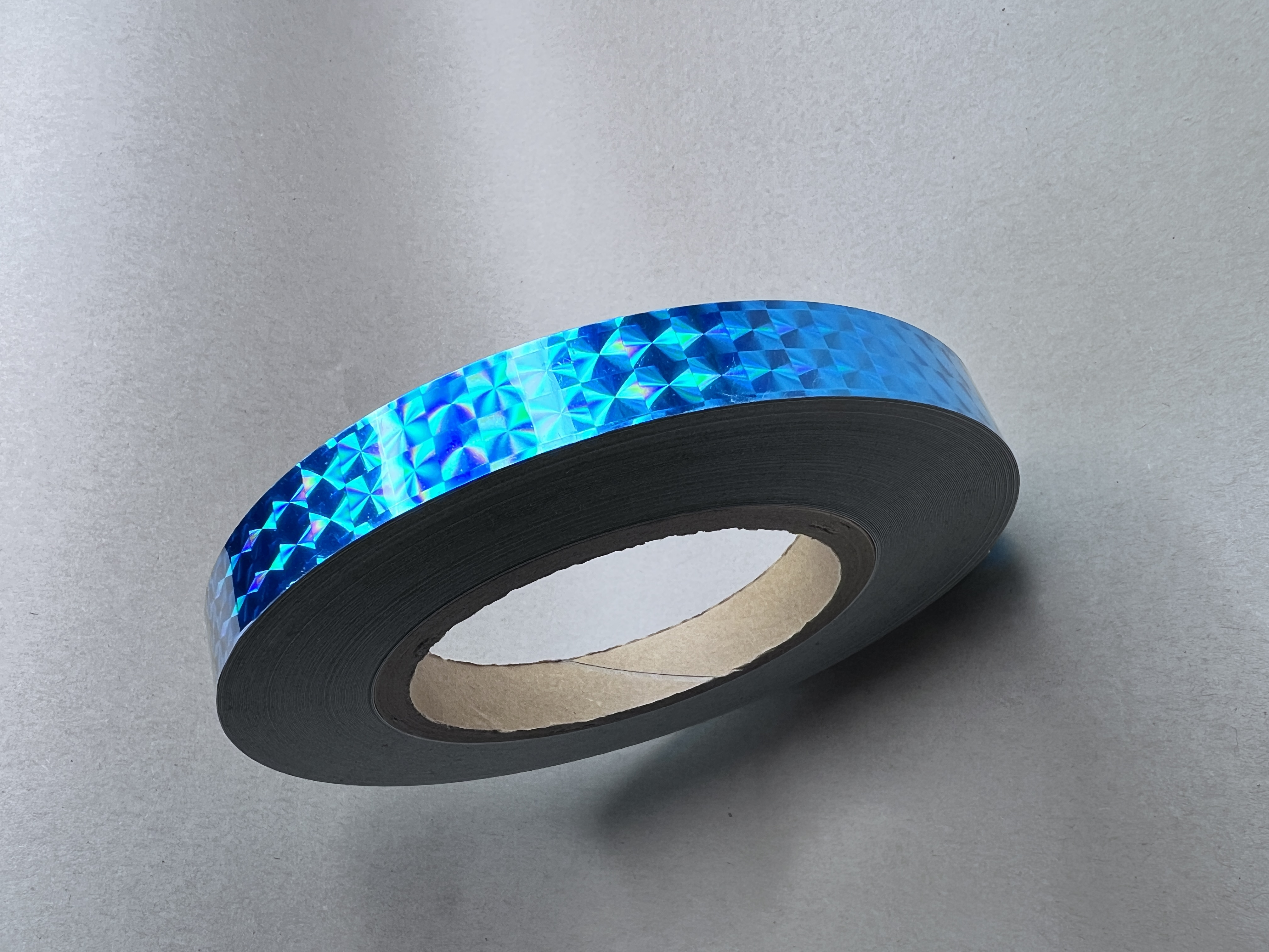 Holografic Prisma Teal 25m 15mm Deco-Tape Hoopologie